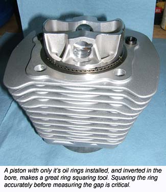 Inverted piston as a ring squaring tool